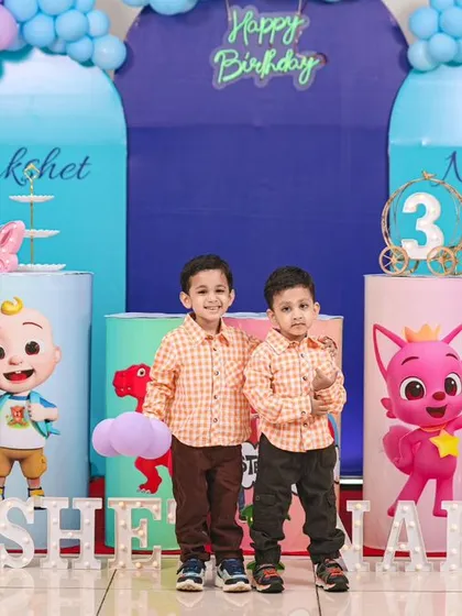 Double the fun with a Cocomelon and Masha and the Bear theme for twin boys. We ensure the decor and portraits highlight the fun of a joint celebration.