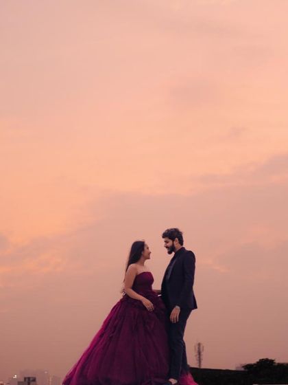 Another stunning silhouette of the couple against a pastel sunset. These are the timeless, romantic images that you will treasure forever.