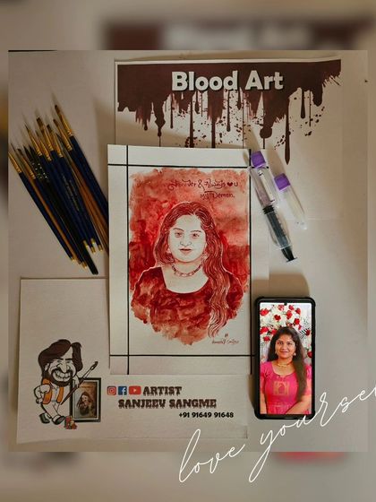 A finished blood portrait, ready to be framed. The process involves careful layering and brushwork to achieve the right tones and details, creating a piece that is both delicate and powerful.