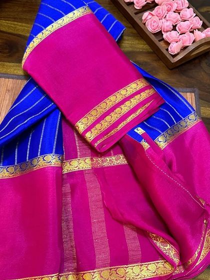 A bold royal blue and rani pink wrinkle crepe Mysore silk saree.