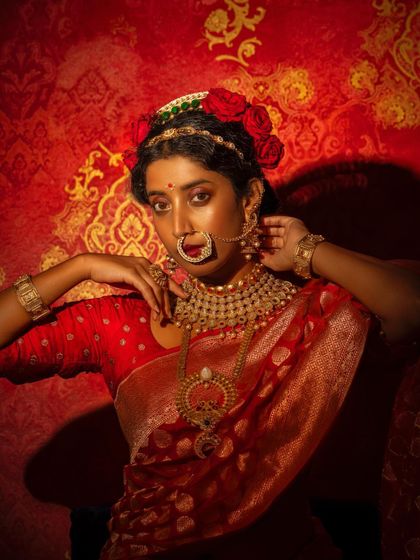 This portrait of Ketaki Narayan showcases the stunning traditional nose ring and choker that were central to this look.