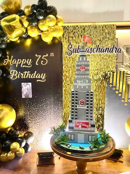 The building cake as the centerpiece of the party's decor. It was a true showstopper.