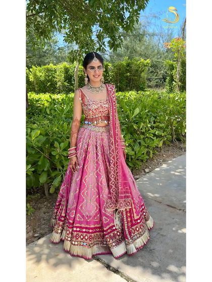 A full-length shot of my Mehendi bride, her mirror braid completing the look perfectly.