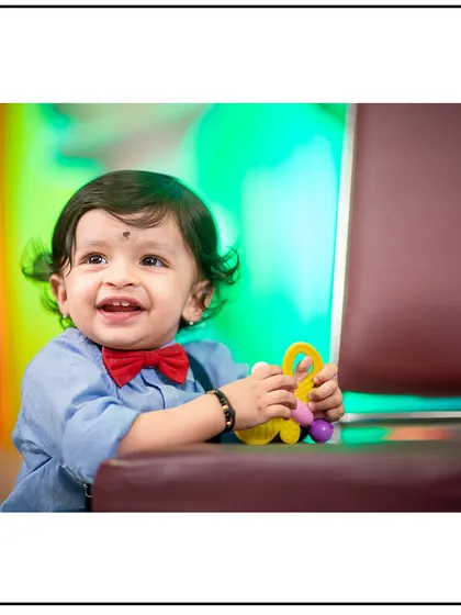 The bright, genuine laugh of a child is priceless. My studio is set up to be a fun and engaging space for kids.