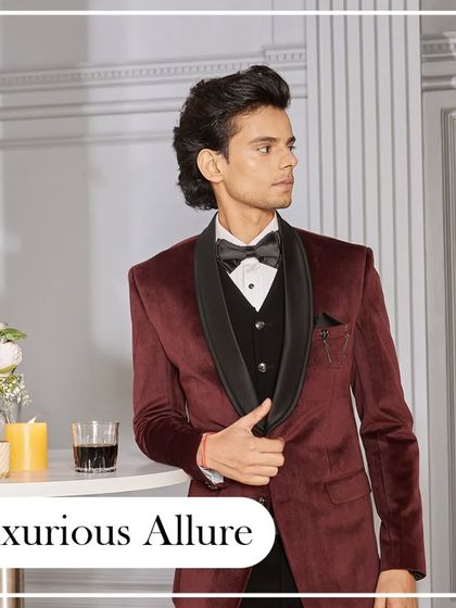 Luxurious allure. This deep maroon velvet tuxedo with a black shawl collar is the epitome of sophisticated taste. It's perfect for a cocktail evening or a winter wedding reception.
