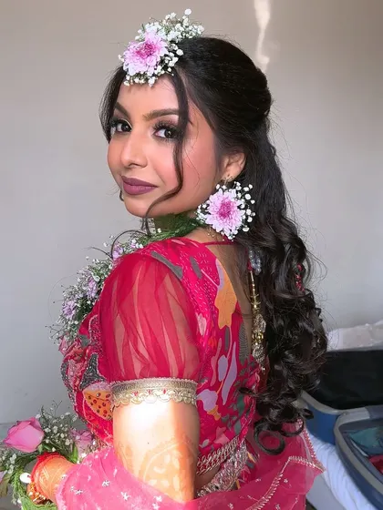 A beautiful side profile of my Haldi bride. The makeup is light and radiant, perfect for a daytime event.