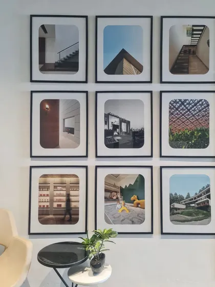 A look at the gallery wall in our studio. This collection of framed images from our projects serves as a constant source of inspiration and a reminder of the diverse spaces we have had the pleasure of creating.