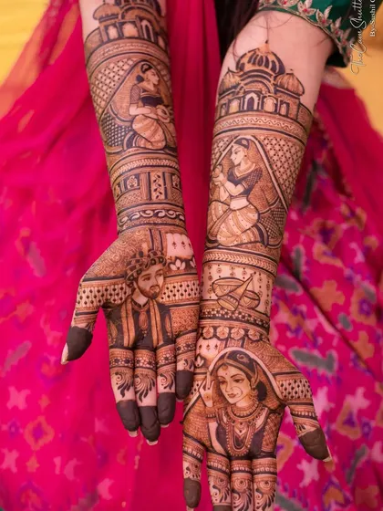 This design includes multiple portraits, with the bride and groom on the forearms and a close-up of the bride's face on the palm.