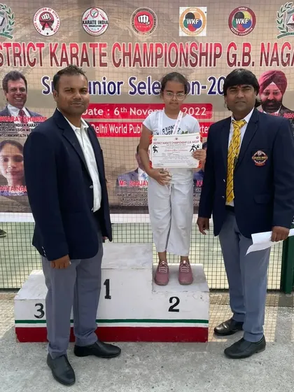 Ahana Chitkara on the podium after winning a silver medal at the district level championship.