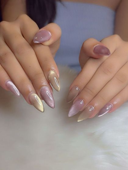 The Korean glass cat eye nails from a different angle, showing their depth.