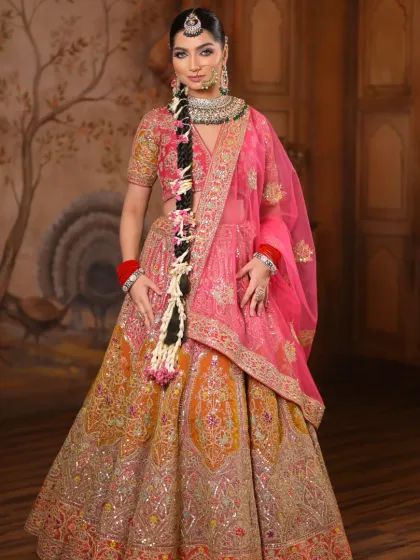 A full-length portrait showcasing the stunning, multi-colored lehenga. The makeup features a contemporary feel with a flawless base and defined eyes, blending tradition with modern style.