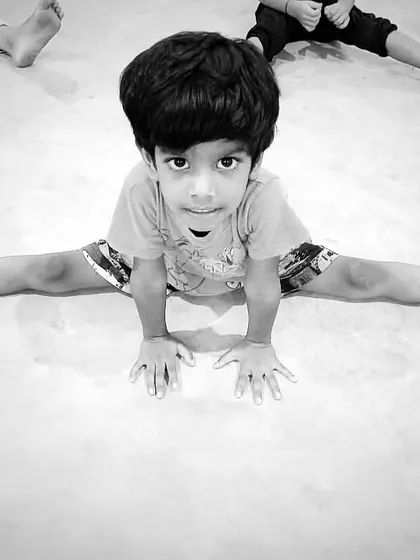 A black and white photo of another young student, showing that hard work is timeless.