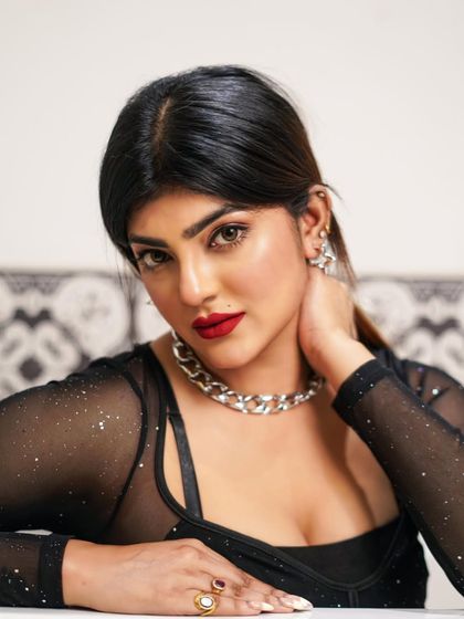 A similar portrait with a slight head tilt, offering a different expression. These subtle variations are key for a comprehensive model portfolio.