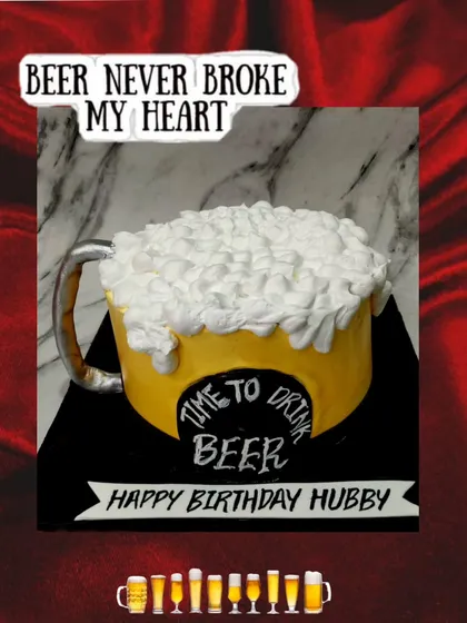 Beer never broke my heart. 🍻 A fun beer mug-shaped cake for a husband's birthday, filled with delicious chocolate cake.