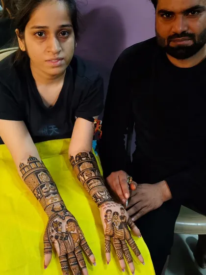 Another satisfied bride with her full-arm story mehandi. I love capturing these moments with my clients.