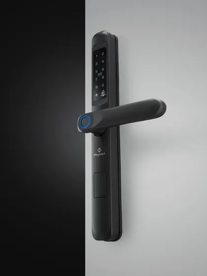 Another utility shot of a different Phynart lock model. The angle highlights the handle's design and the keypad, showing the product from a practical, user-focused perspective.
