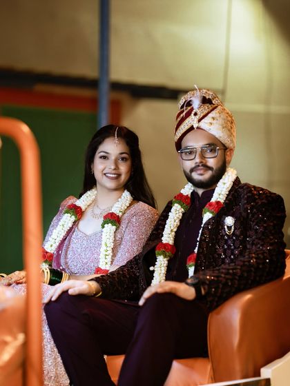 A classic portrait of the couple. The groom's makeup is very minimal, just enough to even out skin tone and reduce shine for the photos, while the bride has a soft, radiant glow.