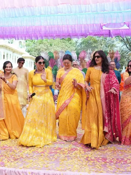 The bride's side showing off their moves. I always encourage a little friendly competition between the families to up the fun factor.