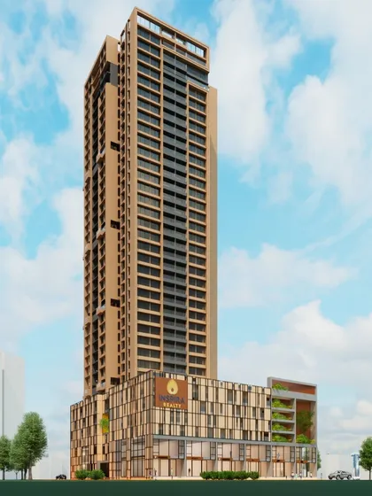 A different angle of the Inspira Realty tower in Borivali, emphasizing its height and the texture of its facade. The design harmonizes nature with contemporary verticality through its green elements and bold geometric shapes.