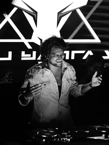 A black and white shot capturing the pure joy and connection I feel with the music and the crowd.