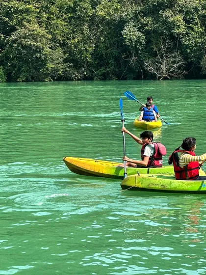 Kayaking on the Kali river in Dandeli. We also organize thrilling water sports adventures for groups.