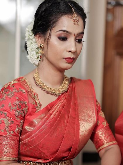 A close-up of the hairstyle, showing the neatness of the bun.