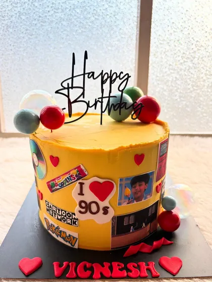 A full view of the 90s throwback cake. It's a perfect, personalized theme for anyone who grew up in that awesome decade.