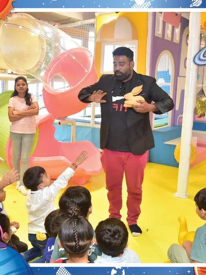 A captivating magic show in progress during a space-themed party. Our professional entertainers keep the kids mesmerized with amazing tricks and interactive fun.