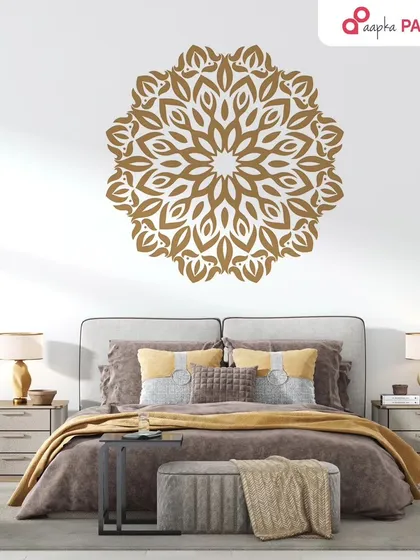A beautiful gold mandala stencil can turn a bedroom into a sanctuary. We carefully painted this intricate design above the bed to create a peaceful and elegant accent wall, adding a touch of spiritual calm and sophistication to the space.
