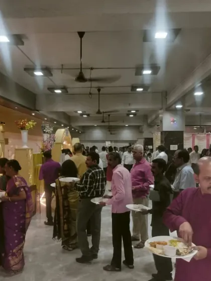 Guests forming a queue at the royal buffet counter during a wedding for 950 people. The setup is designed to be spacious to ensure there is no overcrowding.