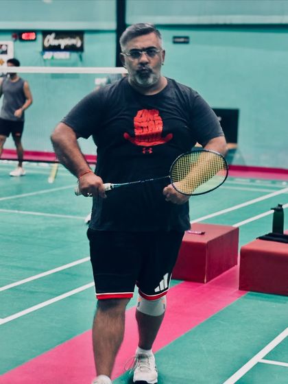 Midweek magic on the court. A player ready for action, showing that age is no barrier to enjoying the game and staying fit.