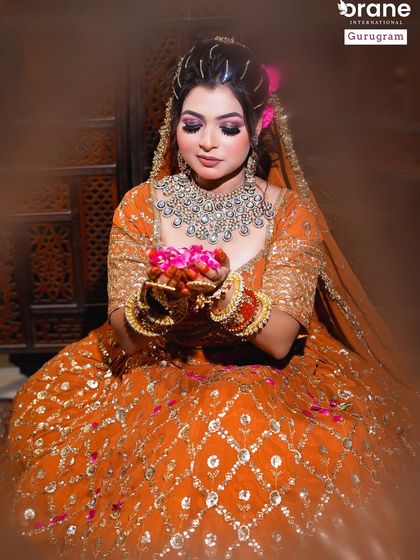 A beautiful shot capturing the bride's soft expression and the richness of the makeup. I train students to create looks that are not only technically perfect but also emotionally resonant.