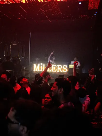 The view from the console at Millers The Luxury Club, Pune. A packed house under the red lights.