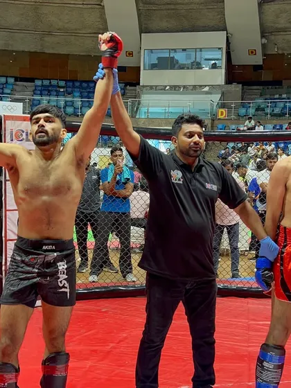 A moment of triumph for Aman Sharma after his debut TKO victory. This is what all the hard work is for.