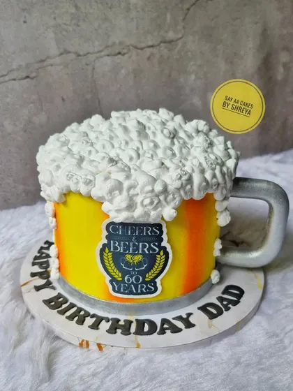 Another take on my popular beer mug cake, this one for a 60th birthday. The design features a custom "Cheers & Beers" edible label and is perfect for milestone celebrations that call for a toast.