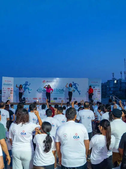 Another shot of our team leading the warm-up at the Tealathon. We ensure everyone is ready to give their best.