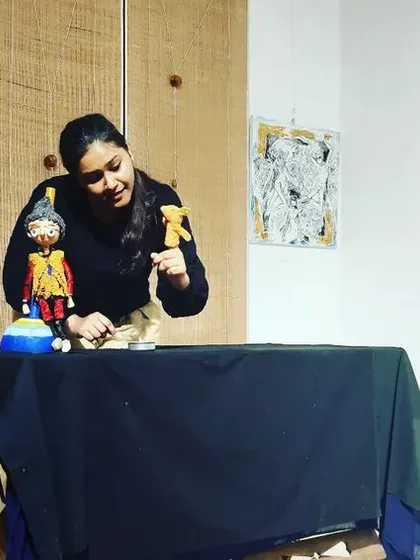 Showing the participants at our workshop how different puppets can interact to create a story.