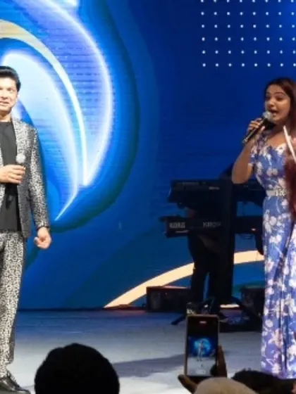 On stage with the legendary singer Shaan during his live concert in Ahmedabad. I ensure a smooth flow and engaging interaction, making the concert a memorable experience.