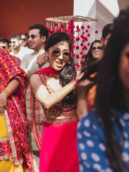 Here I am, right in the middle of the fun with an amazing group at a Mehendi celebration. This picture perfectly captures the energetic and happy vibe I bring to every event. My goal is to be more than a choreographer; I'm part of the celebration.