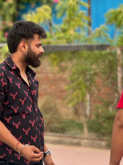 Observing the game flow to make strategic adjustments during a U-17 match.