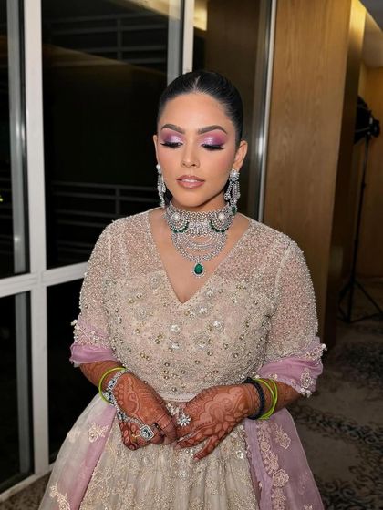 A close-up of the makeup and sleek hair for a glamorous engagement event.