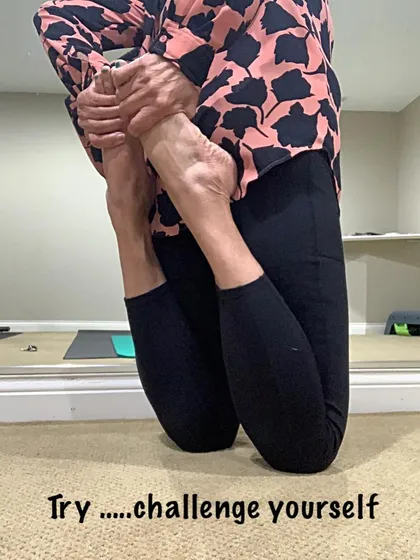 A challenging kneeling balance and flexibility pose. I always encourage my students to challenge themselves safely.