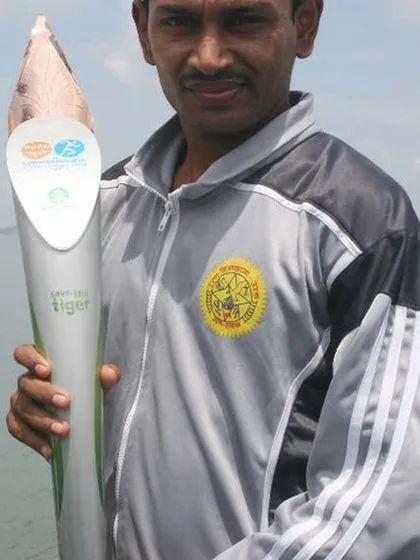 A memorable moment from 2008, holding the Queen's Baton for the Youth Commonwealth Games as it passed through Uran. It was a proud day for our local athletic community.