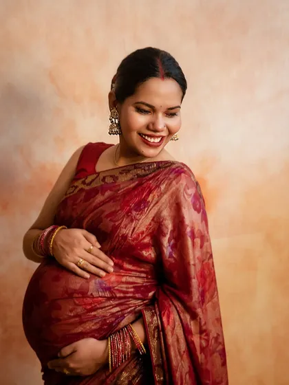 The pure joy of motherhood captured in a radiant smile. I feel so honored to photograph moms-to-be in traditional sarees, celebrating their heritage with grace and beauty.