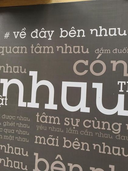 The beautiful typography on the wall at Nhau Studio in Hanoi, setting the mood for the art exhibition.