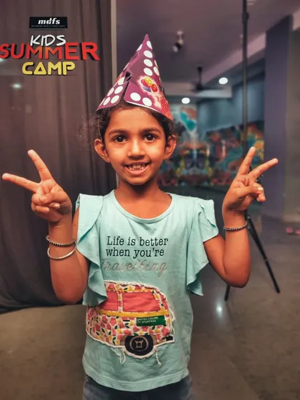 The smile says it all. At my summer camps, it's not just about learning dance or yoga; it's about making memories, feeling happy, and expressing yourself freely in a supportive environment.