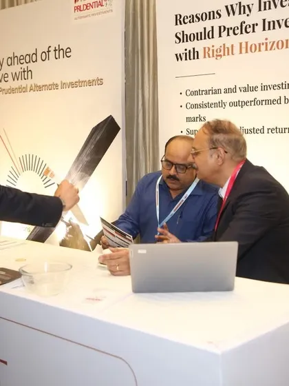 A photo from our event at the Taj Mahal Hotel in Delhi, where our team engaged with investors at our booth. Our Founder & CIO, Anil Rego, is seen discussing our PMS strategies and the reasons to invest with Right Horizons.