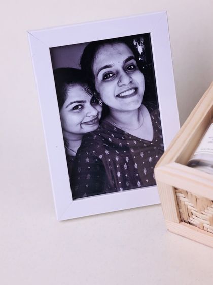 The personalized photo frame that accompanies the sister hamper, turning a cherished memory into a beautiful display piece.