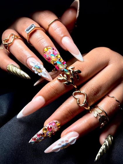 This angle captures the light hitting the rhinestones and the metallic gold, showing the full sparkle of the design.