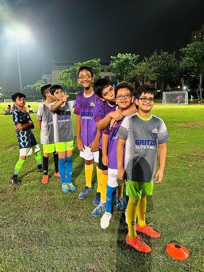 The bond of teammates starts early. Our young wolves having fun and posing for a picture during practice.